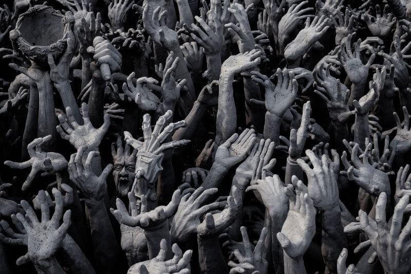 when sin increases showing many hands-on a pit