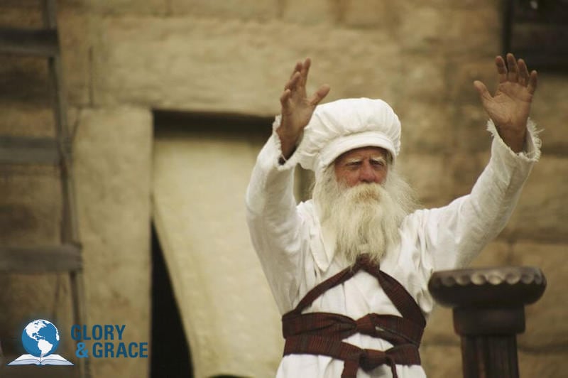 Priests offering spiritual sacrifices to God image showing a jewish priest with his hands lifted up