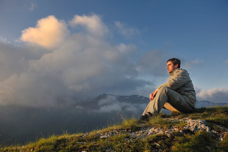 shew me thy glory showing a man sitting and looking up to heaven