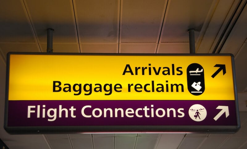 take fast hold of instruction showing directions at an airport