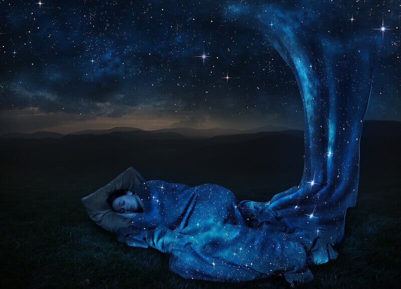 form of God showing a woman sleeping with a blanket of stars