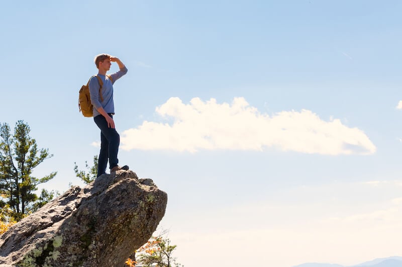without faith impossible to please God showing a man on a hill looking across