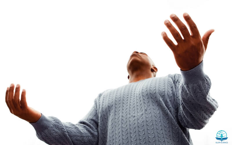 I will bless the Lord at all times image showing a man with lifted hands