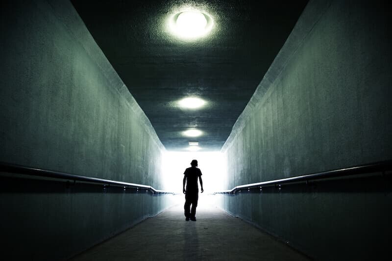 let us walk in the light of the Word showing a man walking in light