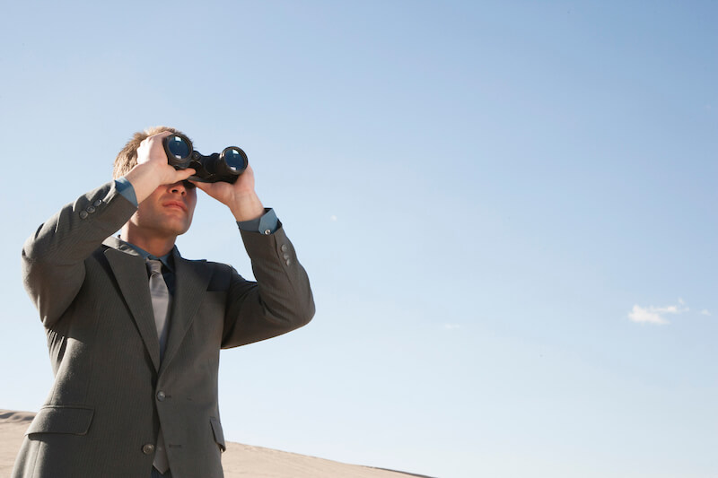 beholding His glory showing a man with binoculars