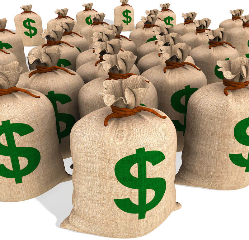 blessed with all spiritual blessings showing a bag of money