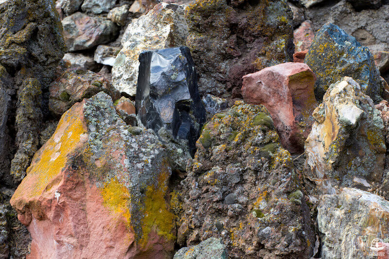 he shall smite the earth with the rod of His mouth showing rocks broken to pieces