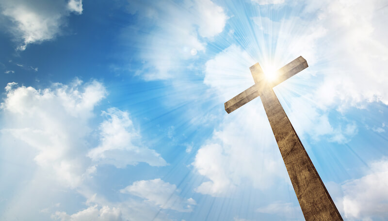 cloud of witnesses showing a cross in the clouds