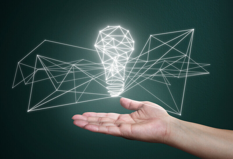 able to do above all we ask or think showing a man holding the image of a light bulb