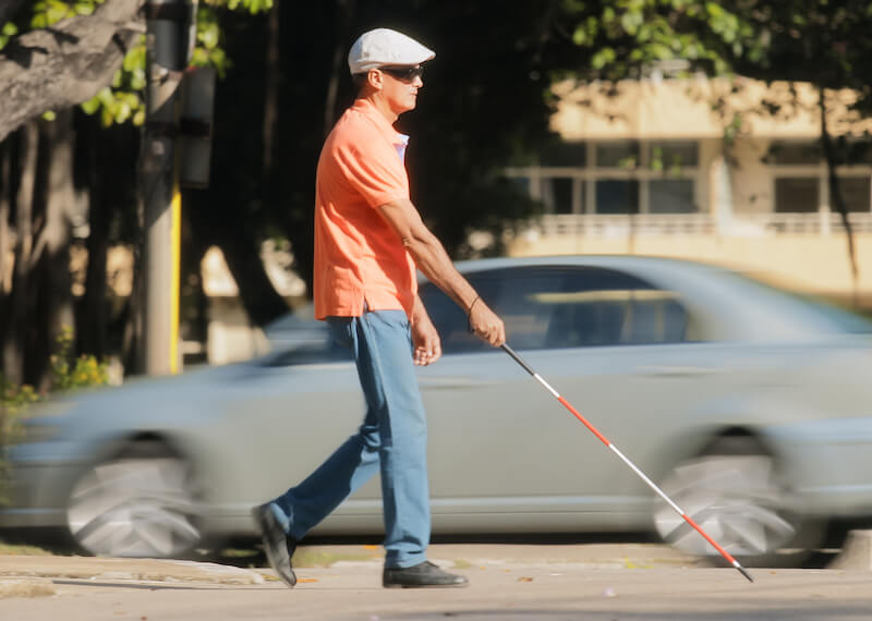 god of this world showing a blind man