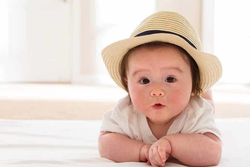 growing up feeding on the word showing a a cute asian baby