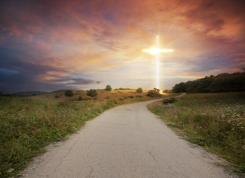 power in the name of Jesus showing the cross