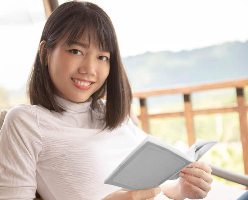 knowledge of God showing an asian woman reading