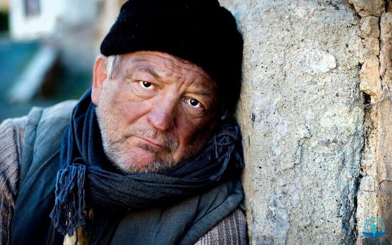 Poor in spirit showing a poor homeless man