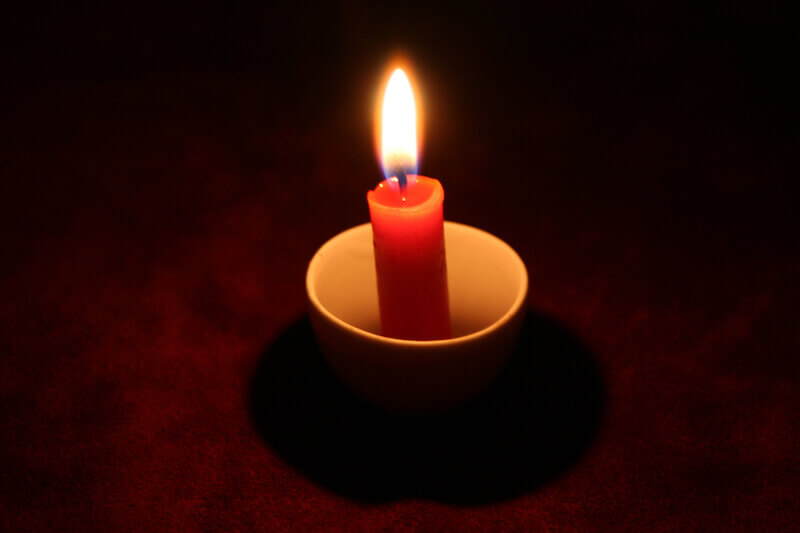 ray of hope showing a candle