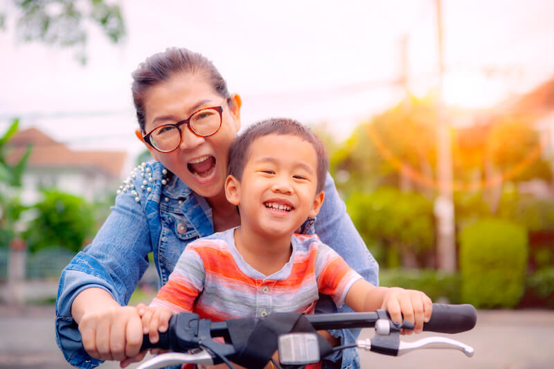 rejoice evermore showing an asian family that is happy