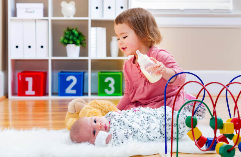 say unto wisdom thou are my sister showing a toddler feeding her baby