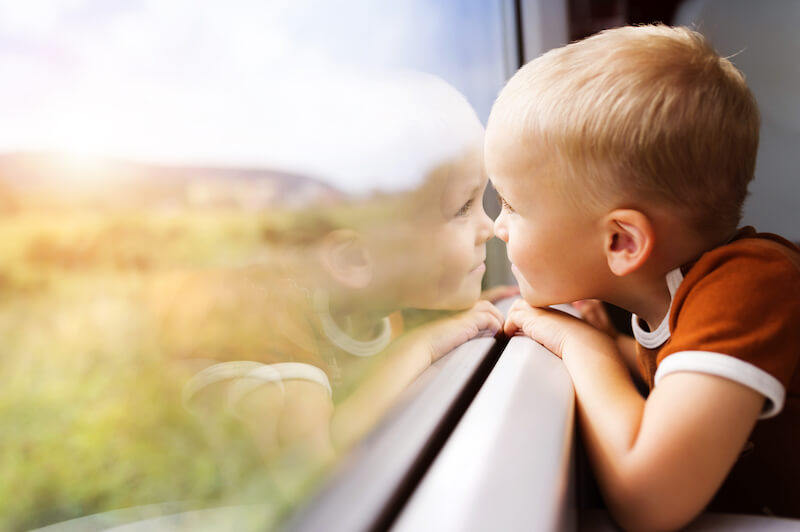 seeing the spirit realm showing a child looking through a window