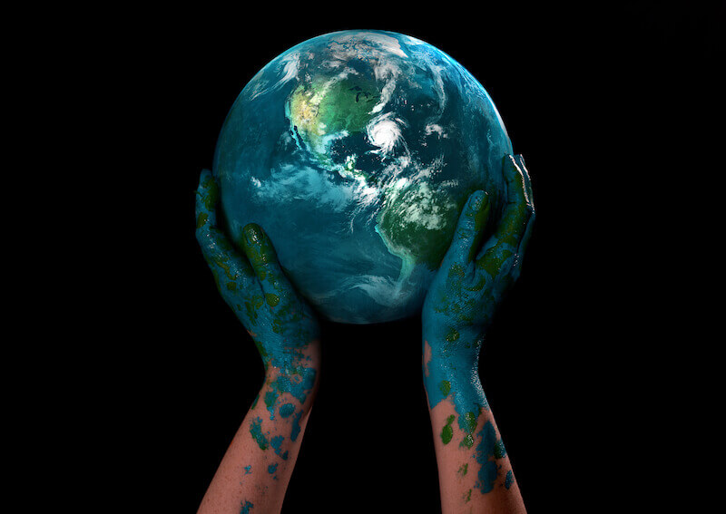 spirit realm showing hands holding the earth