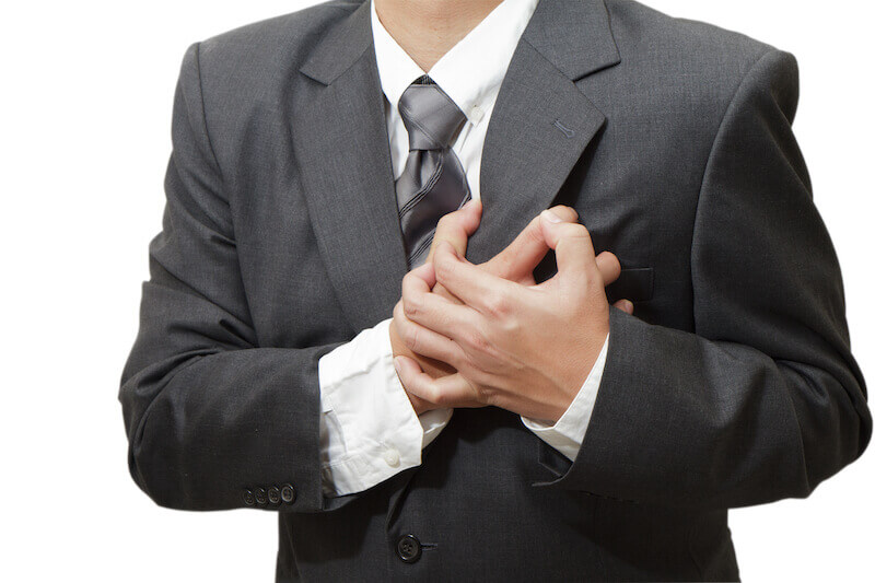 spiritual heart failure showing a man holding his heart