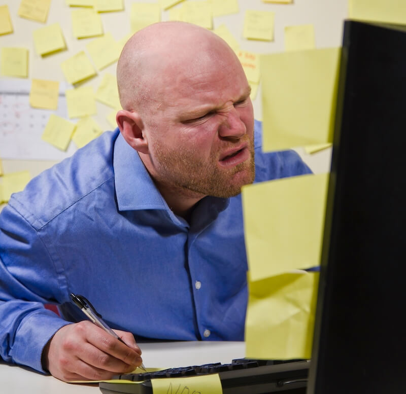 two kinds of understanding showing a man stressed up looking at a computer