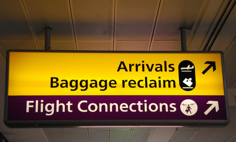 take fast hold of instruction showing directions at an airport