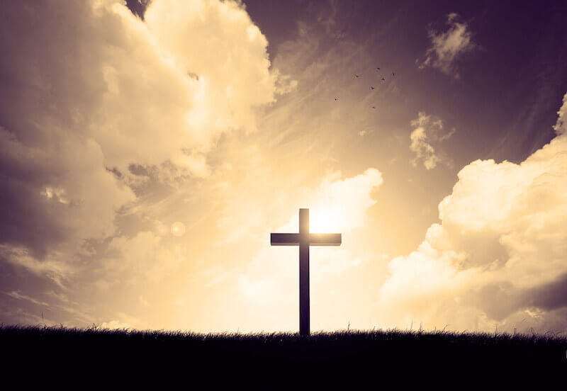 the religious spirit showing a cross