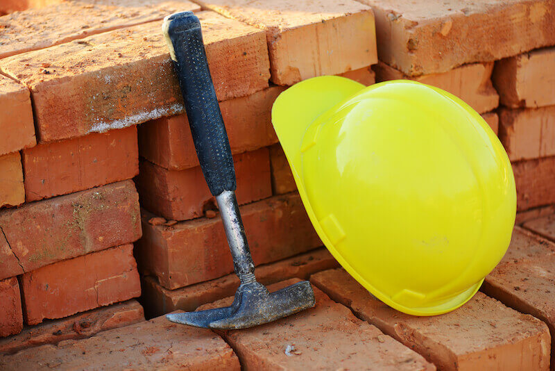 word as hammer that breaks the rock and demolish strongholds showing a hammer
