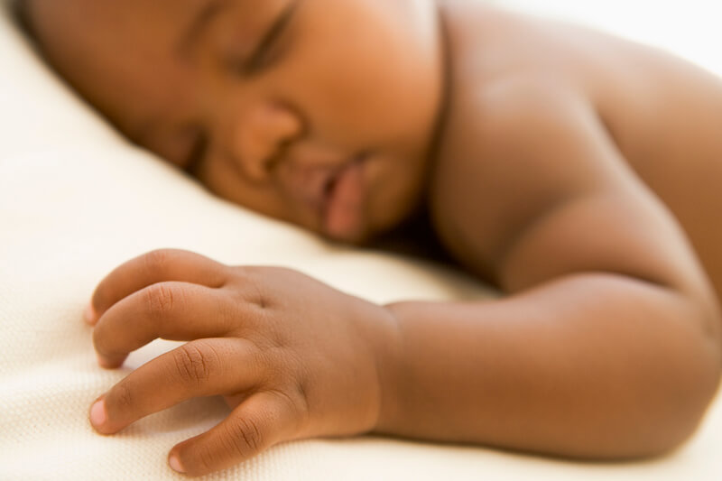 Unto us a son is given showing a baby sleeping