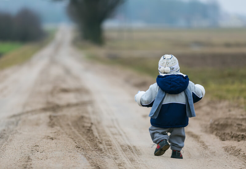 Walking in love showing a little boy walking