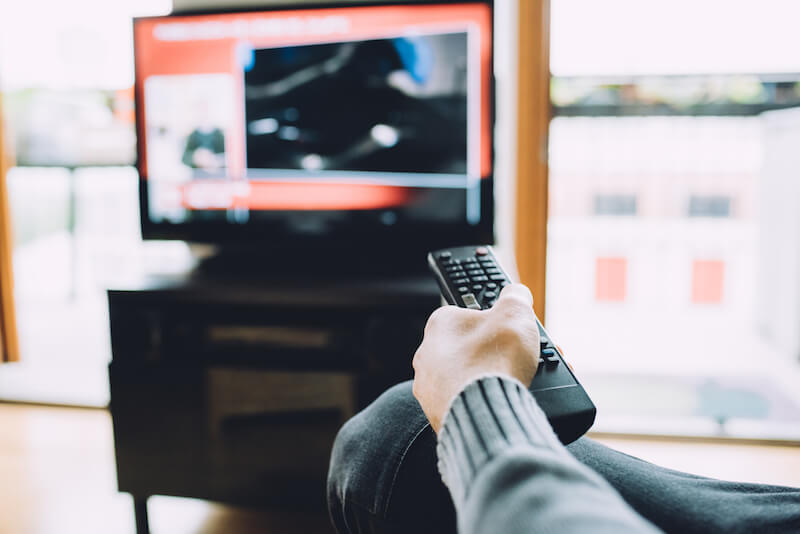yielding ourselves to God showing a man having a remote control