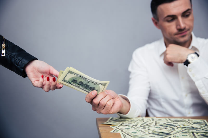 you cannot serve God and money showing a man giving away cash