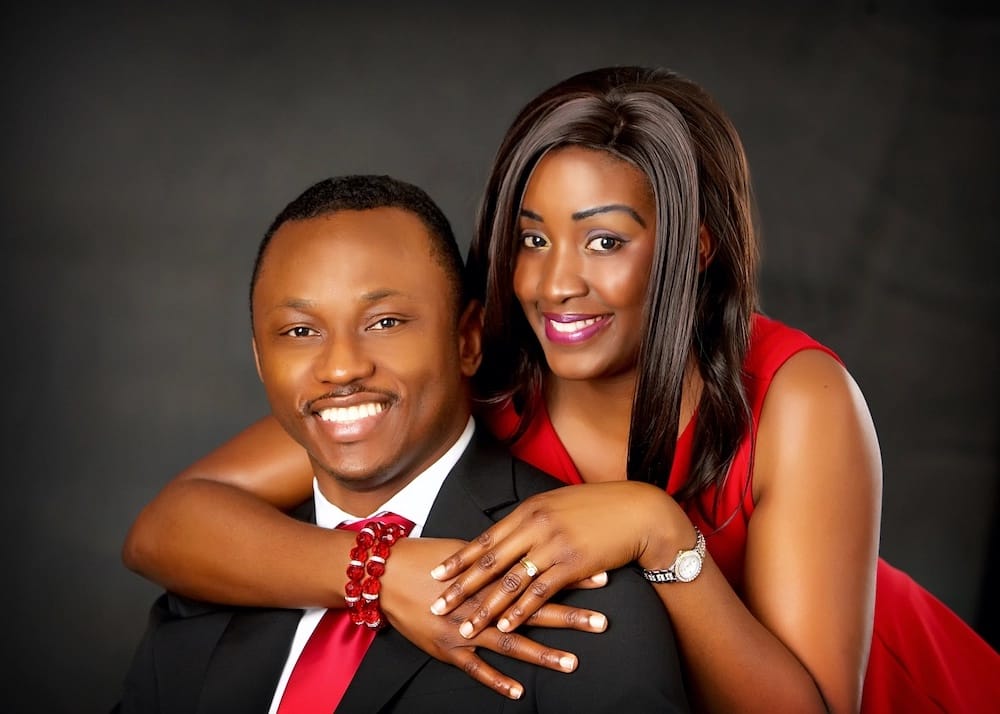 Patrick and his wife smiling together in a portrait for Deshen Ministries.