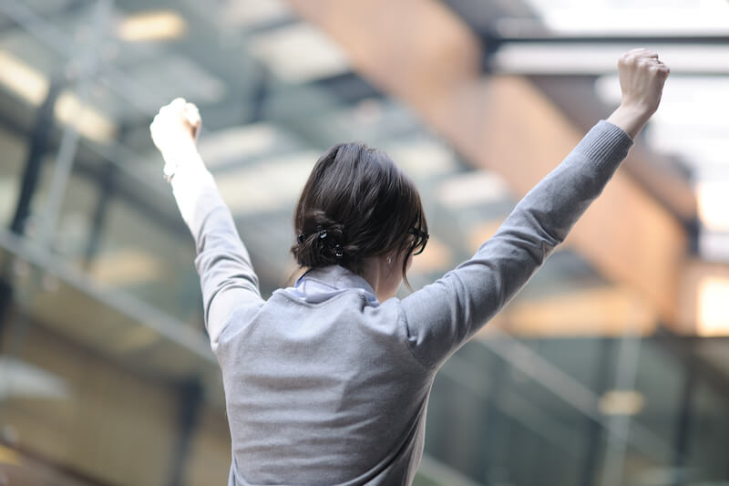 being confident of this very thing showing a confident woman with her hands up