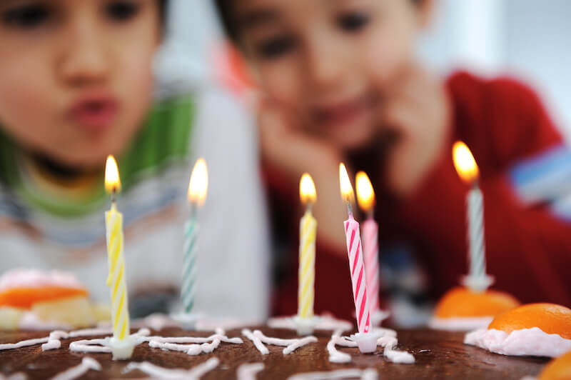 breathe upon me showing kids blowing upon candle