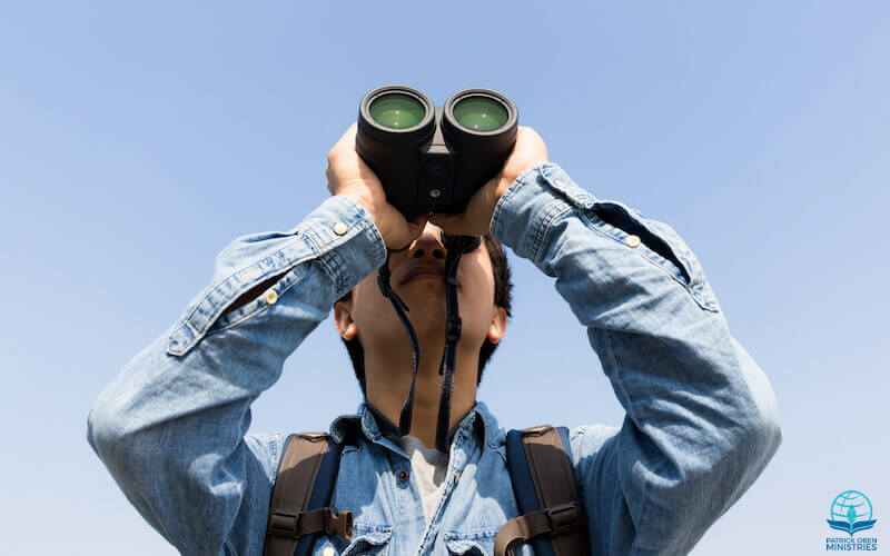 Grace is visible showing a man looking through a telescope