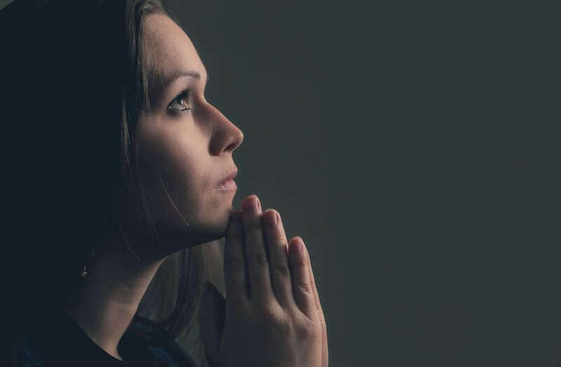he prayed again and the heavens gave rain showing a woman in prayer
