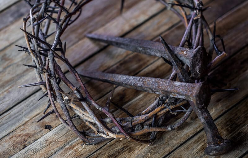 he was wounded for our transgressions showing crown of thorns and nails