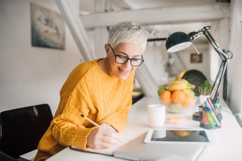 how to write a devotional showing a woman happy and writing