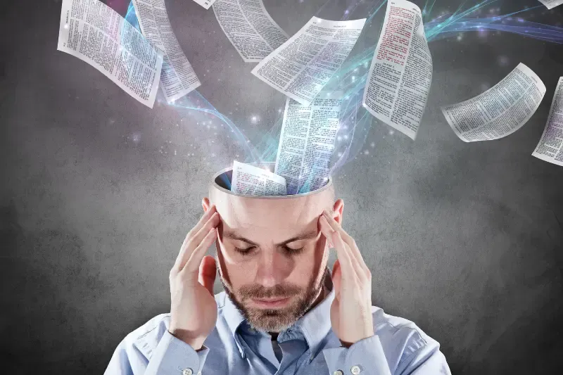 word dwell richly in you showing a man with Bibel pages enterring their heads