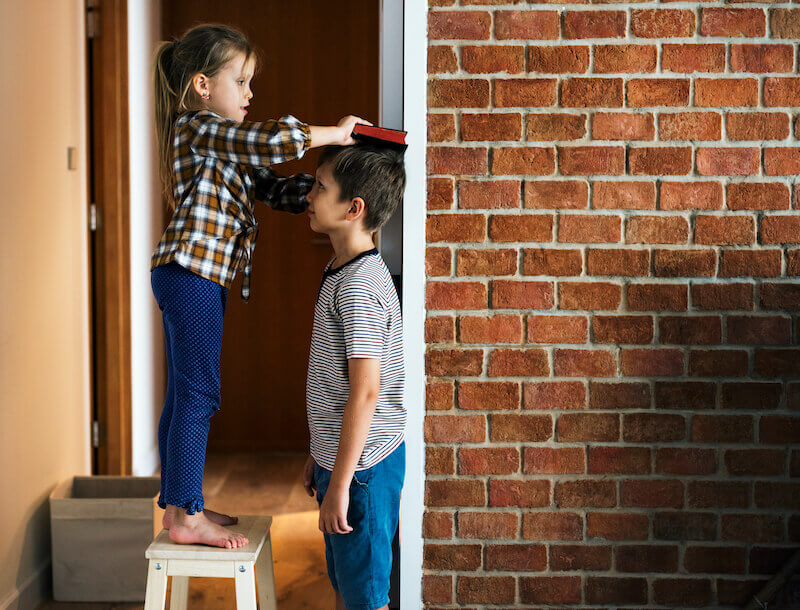 new man is renewed in knowledge after the image of him that created him showing siblings checking height