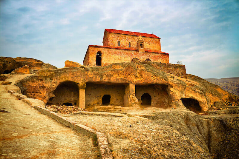 O foolish Galatians who has bewitched you! showing an old church building