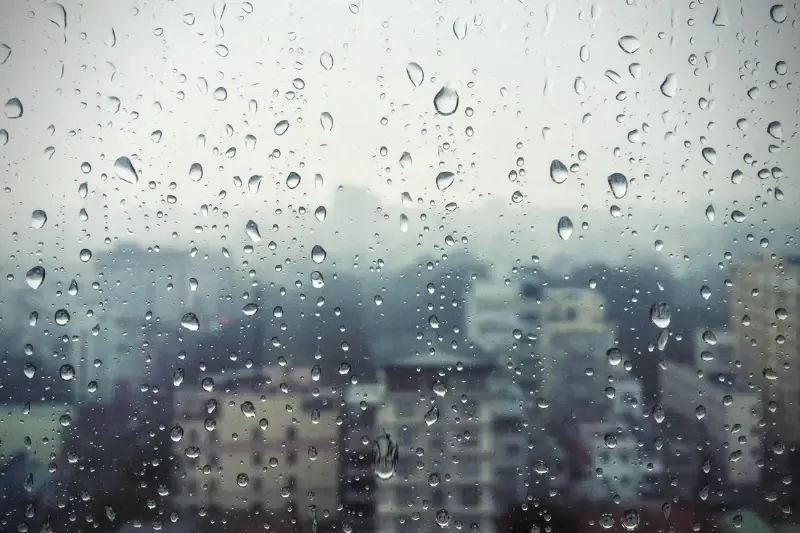 the rain of the Word showing rain falling on a city