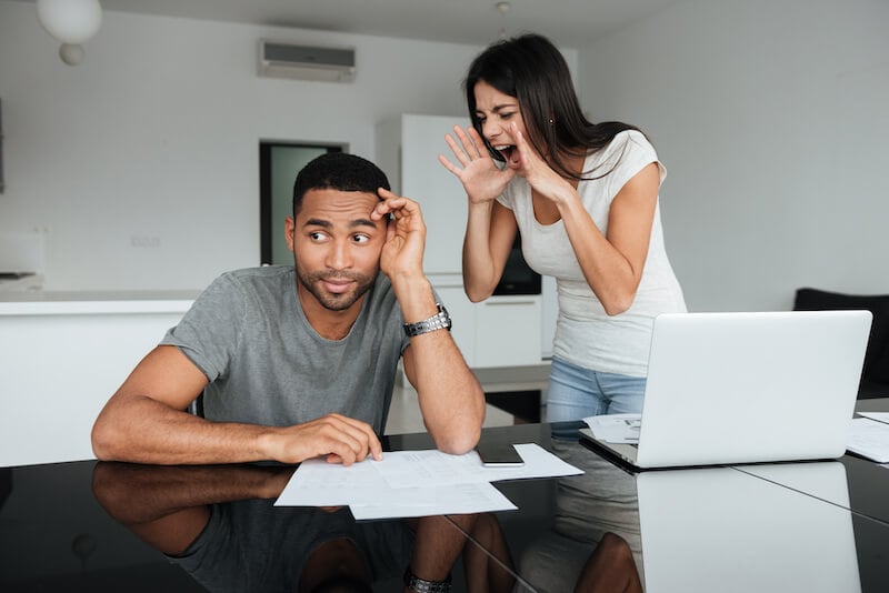 Slow to anger showing a couple querrelling over money