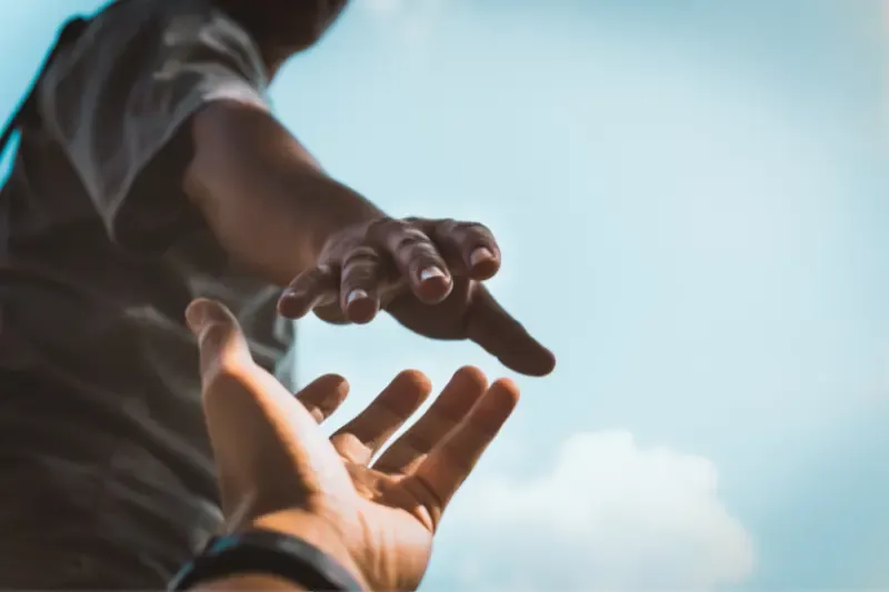 Spirit helps our infirmities showing a helping hand stretched