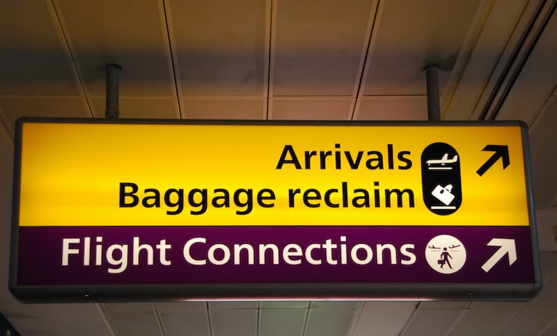 take fast hold of instruction showing directions at an airport