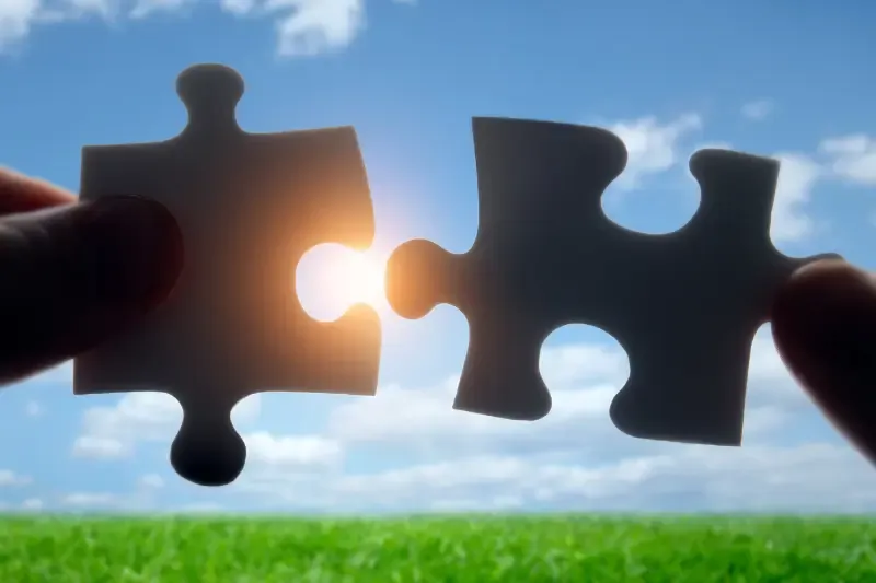 build fellowship with God showing two puzzle pieces fitting together