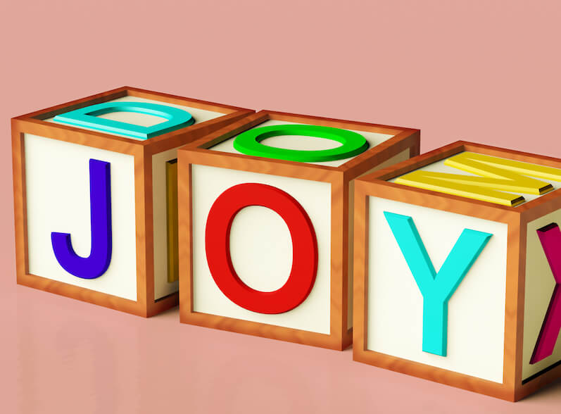 I bring tidings of great joy showing three boxes with the letters of joy