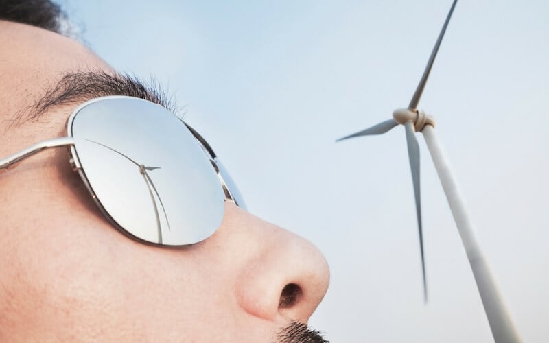 The spirit realm image showing a man watching a windmill