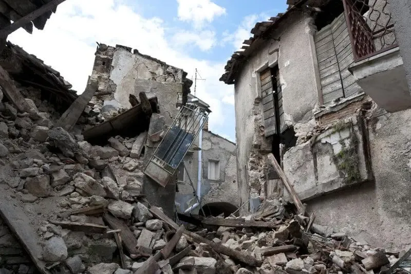 Unmerited showing a delapidated building